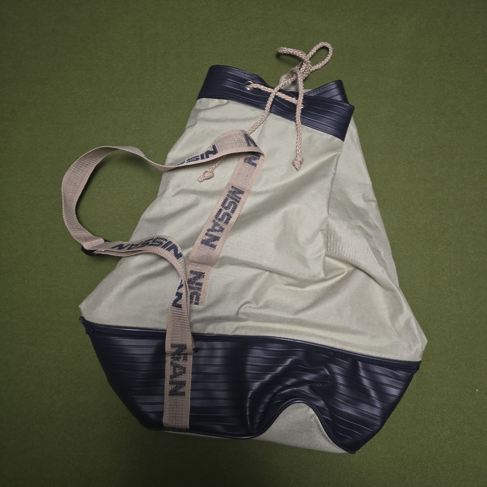 vintage Nissan duffel bag, possibly a dealer promotional item from the 1980s